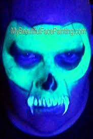 what design will shine at you in the uv chute runthenight co nz neon face paint face painting skull face paint