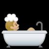 Baby boy taking a bath, playing in a bathtub with colorful toys. 3