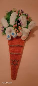 Easter hanger! All items used were from dollar tree. I'm glad I got the  carrot form when I did bc I can't find any now.