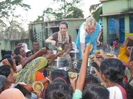 Image result for images of man distributing prasadam