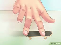 While rolling the board along a surface, press down with your middle finger to bring the nose into the air. Kickflip Mit Einem Fingerboard Machen 12 Schritte Mit Bildern Wikihow