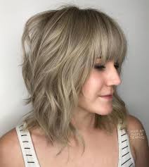 Wispy bob with side bangs. 50 Best Medium Length Hairstyles For 2021 Hair Adviser
