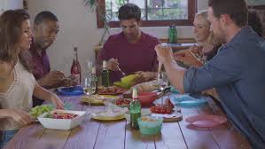 Set out the beef in the slow cooker on warm, along with tortillas, bowls of shredded cheese, salsa, sour cream, and chopped lettuce, jalapenos, onions and tomatoes. Six Young Adult Friends Sit Stock Footage Video 100 Royalty Free 26816056 Shutterstock