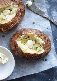 Air Fryer Baked Potatoes Are Fluffy On The Inside Crispy On The Outside Recipe Air Fryer Baked Potato Baked Potato Recipes