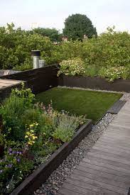 Landscaping Ideas 16 Sustainable Design Tips For A Garden Sustainable Landscaping Rooftop Garden Roof Garden