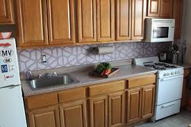 how to paint a geometric tile kitchen