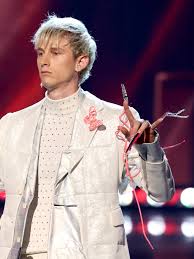 He still calls himself the blonde don. Machine Gun Kelly S Hot Pink And Black Stiletto Nails Are His Longest Manicure Yet See Photos Allure