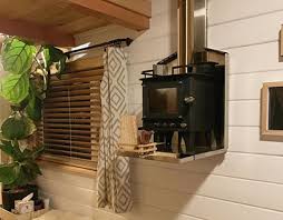 :) hi my name is rob and i am building a budget off grid tiny house by myself. Cubic Mini Wood Stoves On Behance