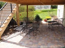 Paver Patio Under Deck With Retaining Wall Steps Minnesota Landscaping Ideas Patio Under Decks Under Deck Landscaping Deck Landscaping