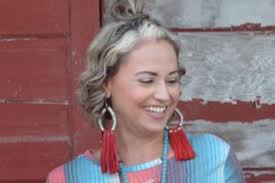 Suspect Arrested in Slaying of Texas Mom Found Fatally Shot in Garage