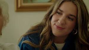 Cheerful Caregiver Helps Client with Poor Vision