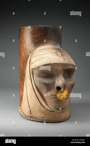 Cream and gold dress hi-res stock photography and images