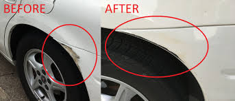 A person applying polishing compound by hand to remove paint transfer from a car door.