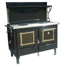 Cook, bake, while heating your home. Wood Cook Stoves Kitchen Queen Ashland Bakers Oven Wood Stoves Wood Stove Cooking Wood Burning Cook Stove Kitchen Queen