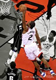 Kawhi leonard is one of the best players in the nba and also happens to have some of the biggest hands in the nba. Kawhi Leonard Toronto Raptors Dunking Over Giannis Antetokounmpo Milwaukee Bucks Conference Cham Poster By Thomas Pollart