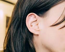 15 Cool Girl Ear Piercings We Discovered On Pinterest Ear Piercings Ear Jacket Earring Cool Ear Piercings