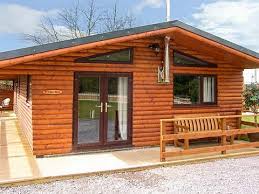Each cabin is fully furnished with a private outdoor hot tub. Log Cabins With Hot Tubs In North Wales Llannerch Holiday Park Log Cabins