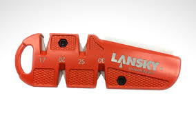 • insert the rods all the way to the bottom of the holes. Lansky C Sharp Deluxe 5 Stone Sharpening System Everyday Carry