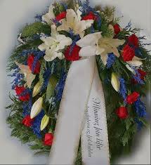 Funeral flower messages are always difficult to write because you must find appropriate words for funeral flowers that will help you convey your grief and loss. Funeral Wreath With One Decoration With White Lilies Blue Solidago And Red Roses In 3 Sizes I Husi Bloma Flower Delivery Shop Iceland