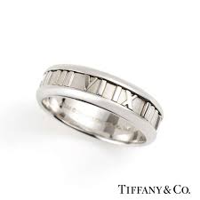 In 18k gold, an unsizeable ring size 5 1/2. Tiffany Co 18k White Gold Atlas Ring Rich Diamonds
