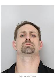 Three arrested after police serve warrant