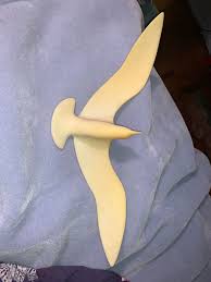 I got this at a thrift store. It seems to be part of something MCM I  faintly recall. It makes a great Christmas tree topper.