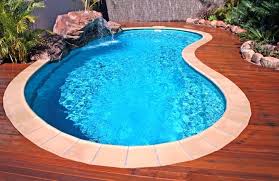 Small Kidney Shape Pool With Wooden Deck Swimming Pool Decks Kidney Shaped Pool Backyard Pool