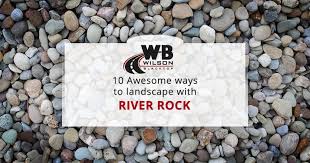 If you think the phrase ?landscaping with rocks? 10 Awesome River Rock Landscaping Ideas Wilson Blacktop