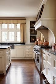 White is one of the most common kitchen cabinet colors for its simplicity and neutrality. What To Do When You Secretly Love Cream Kitchen Cabinets Heather Hungeling Design