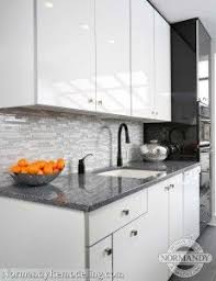 Great Look For A Modern Kitchen Style White High Gloss Kitchen Cabinets From Plain An Galley Kitchen Remodel Kitchen Remodel Countertops Cheap Kitchen Remodel