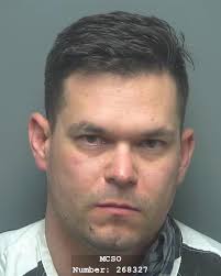 RACCA, DANIEL TRAVIS