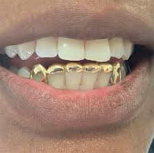 High quality gold grillz gifts and merchandise. Shop Gold Teeth Master