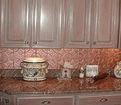 This family room bar has a metallic backsplash that adds glamour to this space. Backsplashes Faux Metal Old House Web