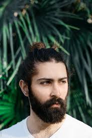Long hairstyles for men look amazing and longer hair is something that should be treasured! Portrait Of A Mixed Race Man In Front Of Some Palm Leaves By Beatrix Boros Portrait Palm