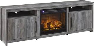 Popular bedroom set designs have beds, cabinets, side tables, storage sections, etc. Signature Design By Ashley Baystorm Gray 75 Tv Stand With Electric Fireplace W221w1 Fitz S Furniture Gallery