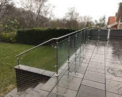 Glass Railings For Raised Patio Raised Patio Patio Garden Patio Railing