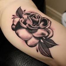 The leaves of the gardenia are filled with black elevating the pattern in the center efficiently. 61 Gardenia Tattoo Ideas Gardenia Tattoo Gardenia Tattoos
