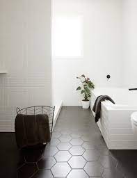 The brick look tiled wall has been finished off with black grout which gives it that. Kitchen Trend We Love Black Tiles With Black Grout Apartment Therapy