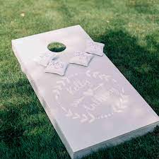Bobbing for doughnuts as if we need an excuse to eat doughnuts, this outdoor wedding game is both delicious and fun. 30 Wedding Reception Games Activities Your Guests Will Love