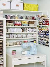 Two accommodating storage pieces are placed on opposite walls, their surface areas maximized: Sewing Station In Craft Room Sewing Room Storage Solutions Sewing Room Design Sewing Room Storage
