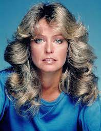 And despite being more than 40 years old, it is still being copied. Farrah Fawcett 70 S Hair Style 70s Hair 1970s Hairstyles Vintage Hairstyles