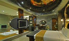 Batman Tv At The End Of Your Bed Yes Please Amazing Bedroom Designs Batman Room Batman Themed Room