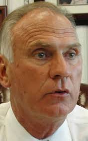 Corzine puts squeeze