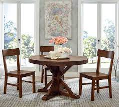 Pottery barn benchwright round pedestal extending dining table. Benchwright Round Pedestal Extending Dining Table Pottery Barn