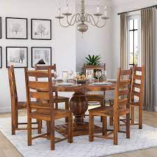 Use it as a 44 inch round for seating for four; Cloverdale Rustic Solid Wood Round Dining Table Chair Set