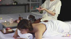Beautiful young asian woman relaxing with hot stone spa massage in spa  beauty salon 8082463 Stock Video at Vecteezy