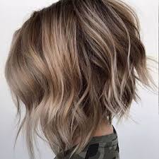 Dark brown beach wavy hairstyle. 17 Instagram Beach Wave Looks To Inspire Your Inner Surfer Girl