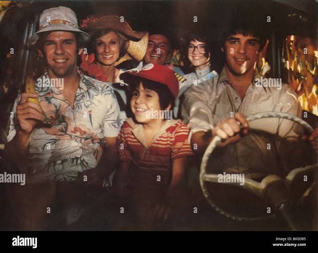 HERBIE GOES BANANAS (1980) CHARLES MARTIN SMITH, JOAQUIN GARAY III, STEPHEN  BURNS (C) DISNEY HGB 008FOH Stock Photo - Alamy