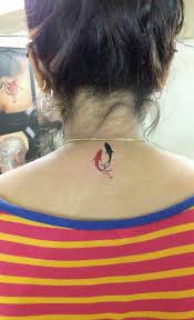 small koi fish tattoo mumbaitattoocolaba 919967301133 tattoo koifishtattoo koitattoo smalltattoo necktattoo napetattoo c tattoo ideen tattoo son