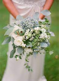 What kinds of flowers are most appropriate for a wedding. September I Heart Flowers Blue Wedding Bouquet Wedding Flowers Orange Wedding Flowers